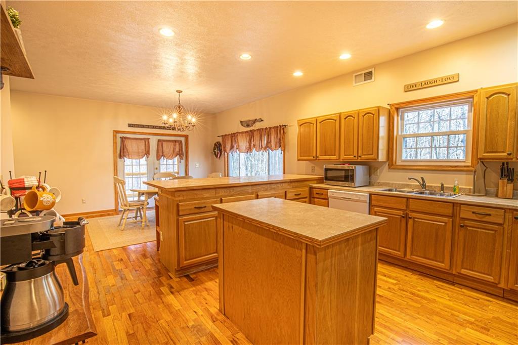 505 Greenbriar Road Dunbar, PA 15431 - Photo 11 of 43 a kitchen with a sink stove and cabinets