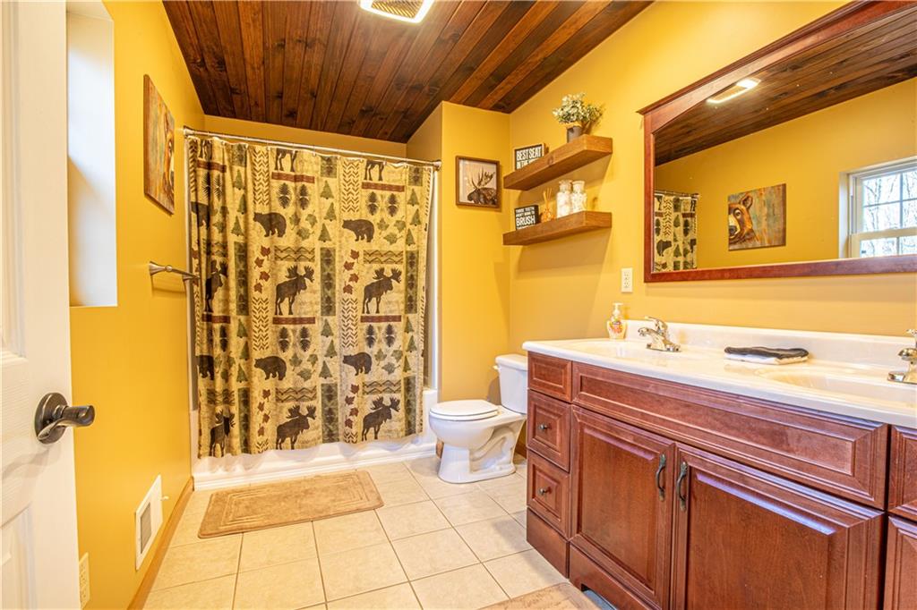 505 Greenbriar Road Dunbar, PA 15431 - Photo 29 of 43 a bathroom with a sink and a mirror