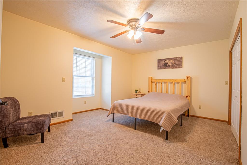 505 Greenbriar Road Dunbar, PA 15431 - Photo 31 of 43 a bedroom with a bed and a couch