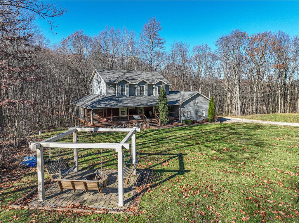 505 Greenbriar Road Dunbar, PA 15431 - Photo 40 of 43 a view of a house with big yard and a large tree