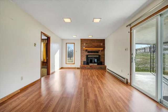 a kitchen with stainless steel appliances granite countertop a stove and a refrigerator