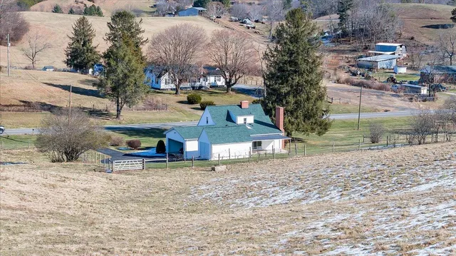 a view of empty room with fireplace