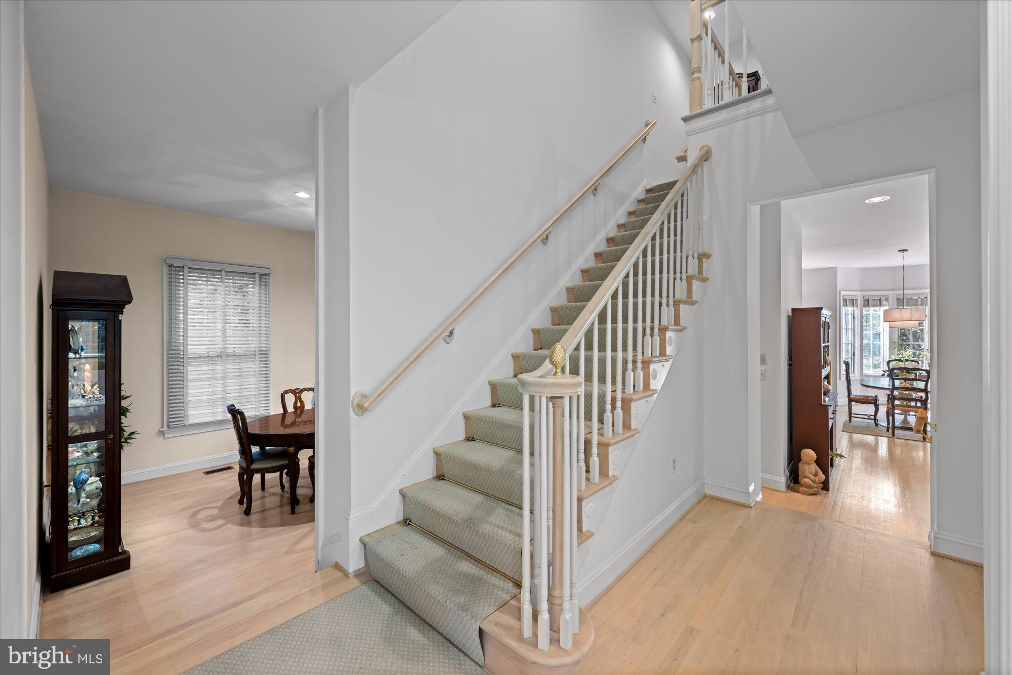 9729 Beman Woods Way Potomac, MD 20854 - Photo 16 of 41 a view of entryway and hall with wooden floor