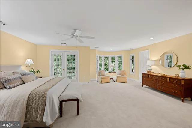 a bed room with bed and window