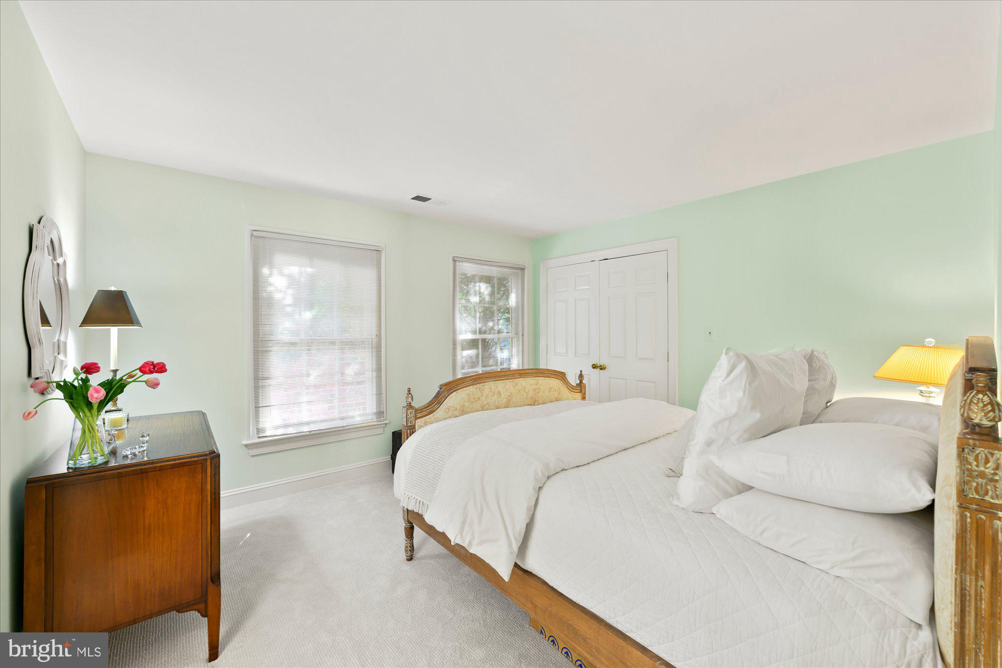 9729 Beman Woods Way Potomac, MD 20854 - Photo 26 of 41 a spacious bedroom with a bed and window