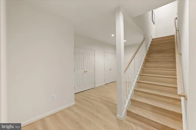 a view of entryway with wooden floor