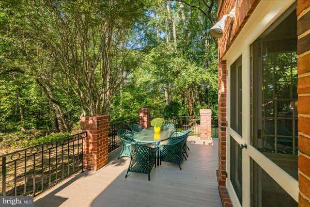 a view of a balcony with chairs