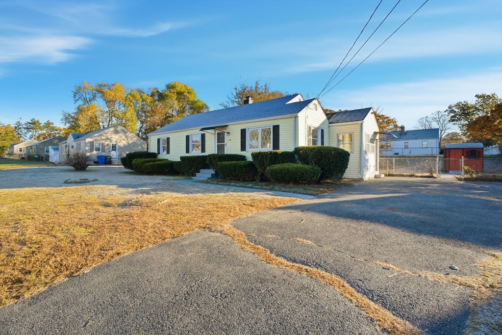 105 Denwall Drive Springfield, MA 01119 - Photo 3 of 29 a front view of a house with a yard
