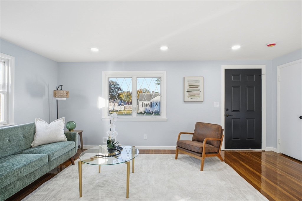 105 Denwall Drive Springfield, MA 01119 - Photo 5 of 29 a living room with furniture and a rug