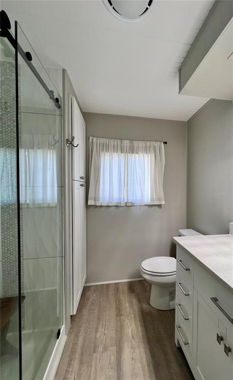 1100 South Belcher Road, Unit 772 Largo, FL 33771 - Photo 42 of 84 a bathroom with a sink a toilet and shower