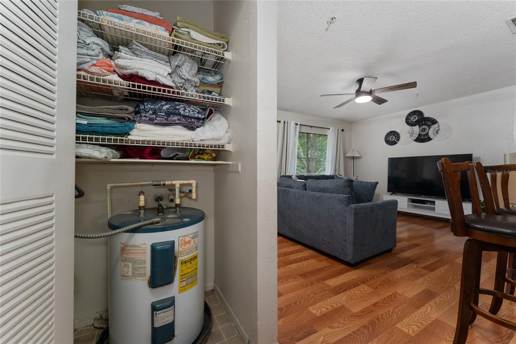 627 Dory Lane, Unit 304 Altamonte Springs, FL 32714 - Photo 23 of 28 a living room with furniture and a flat screen tv