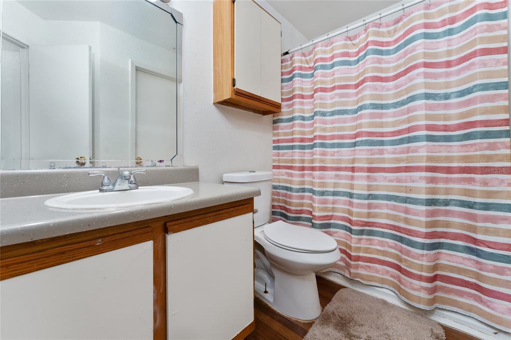 627 Dory Lane, Unit 304 Altamonte Springs, FL 32714 - Photo 24 of 28 a bathroom with a sink and a toilet
