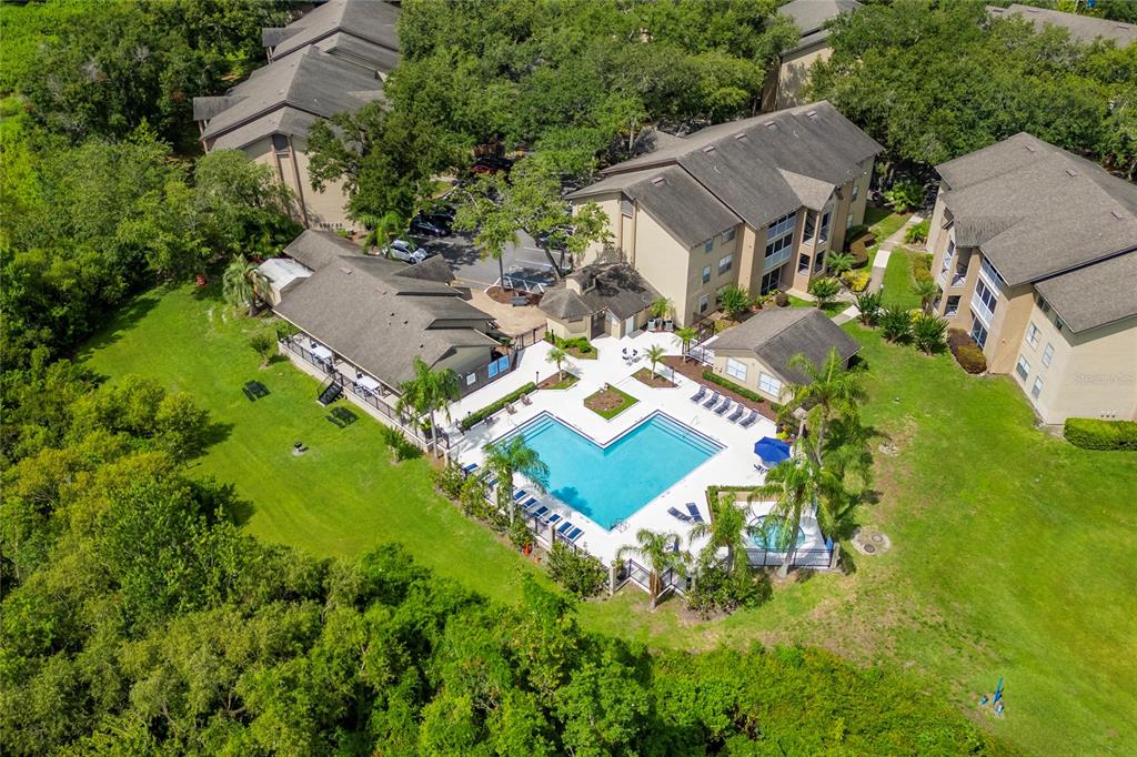 627 Dory Lane, Unit 304 Altamonte Springs, FL 32714 - Photo 3 of 28 an aerial view of residential house with outdoor space and trees all around
