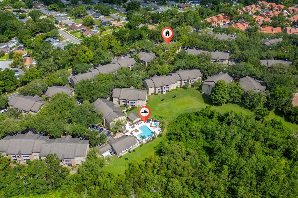 627 Dory Lane, Unit 304 Altamonte Springs, FL 32714 - Photo 5 of 28 an aerial view of a house with a yard and garden