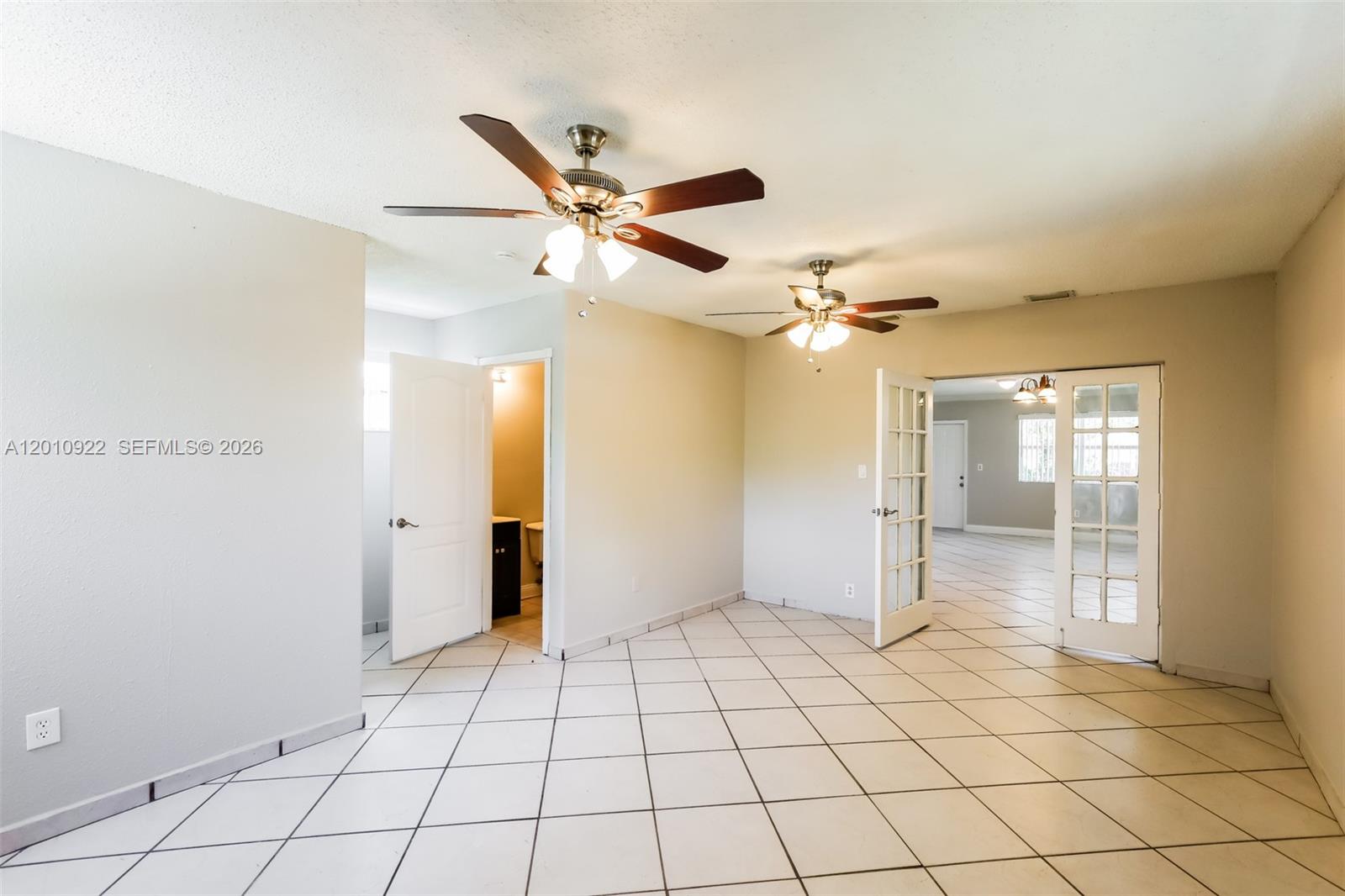 11460 Southwest 199th Street Miami, FL 33157 - Photo 11 of 18 a view of an empty room