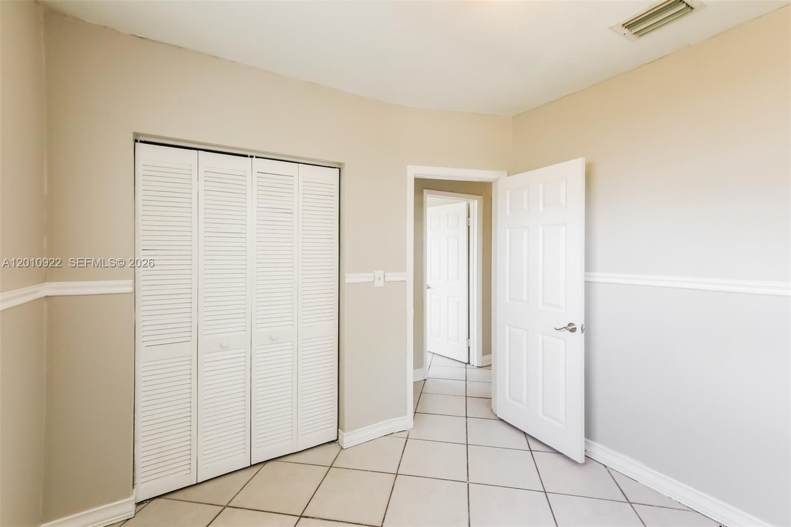 11460 Southwest 199th Street Miami, FL 33157 - Photo 15 of 18 a view of an empty room