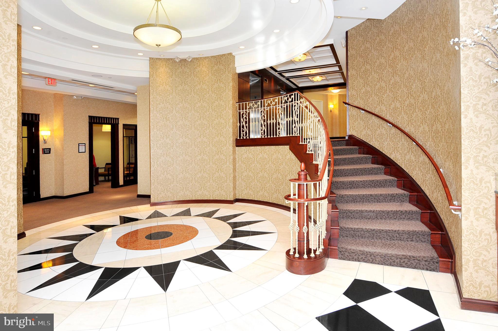 1391 Pennsylvania Ave. Southeast, Unit 403 Washington, DC 20003 - Photo 19 of 34 a view of entryway and hall with wooden floor