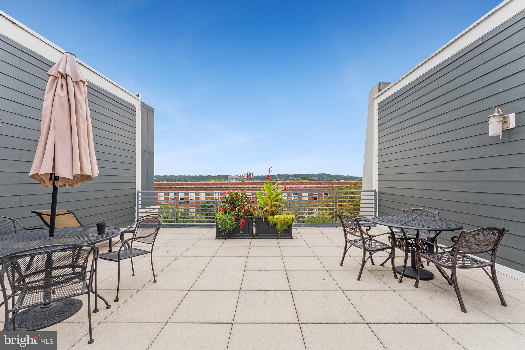 1391 Pennsylvania Ave. Southeast, Unit 403 Washington, DC 20003 - Photo 22 of 34 a view of a terrace with furniture