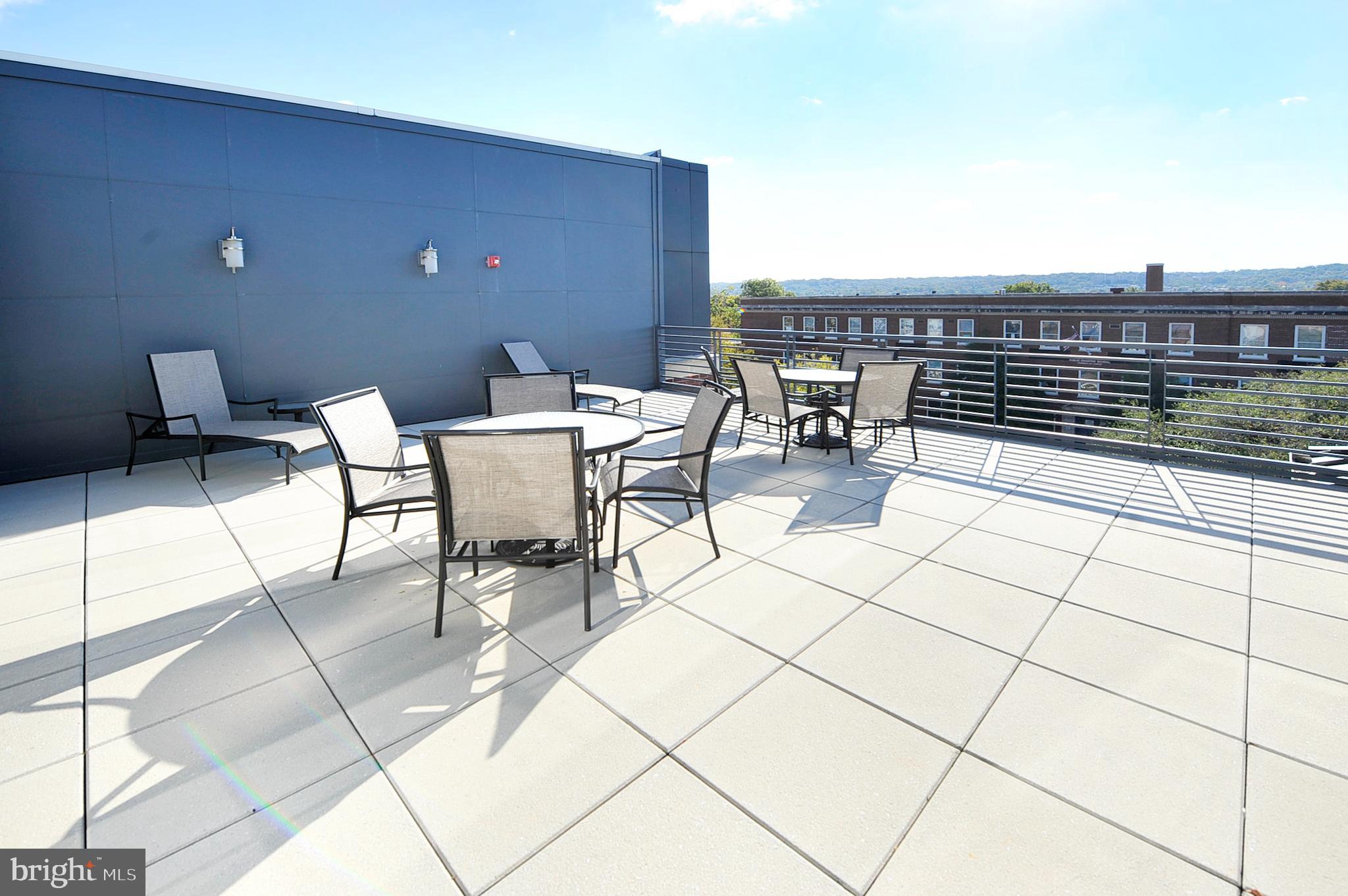 1391 Pennsylvania Ave. Southeast, Unit 403 Washington, DC 20003 - Photo 24 of 34 a view of a terrace with seating area