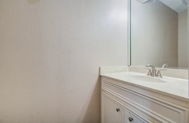 a bathroom with a sink and a toilet