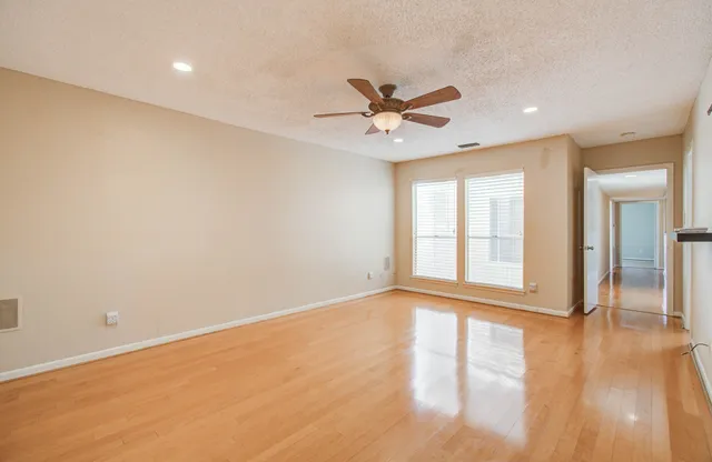 a bathroom with a shower and a sink