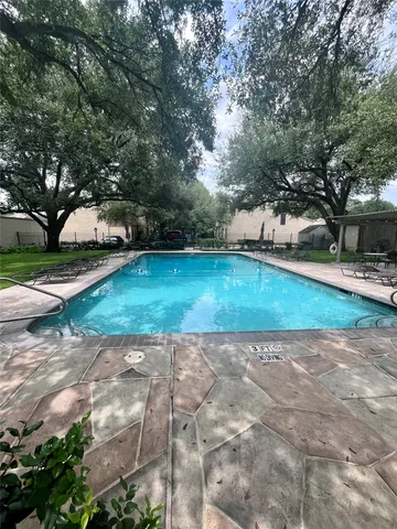a view of backyard with green space