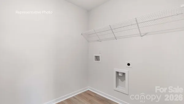 a view of a room with racks on the wall