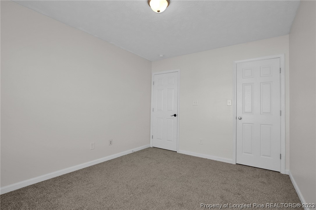 84 Loyalist Road Cameron, NC 28326 - Photo 20 of 40 a view of an empty room with a window