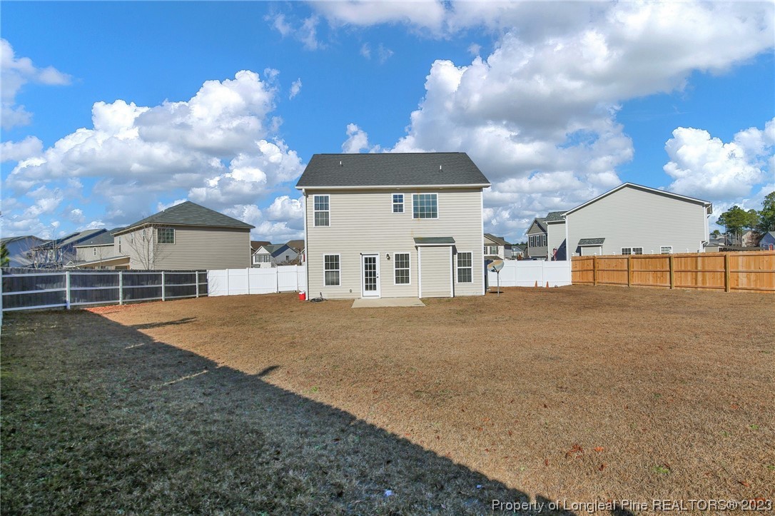 84 Loyalist Road Cameron, NC 28326 - Photo 2 of 40 a view of a house with a yard