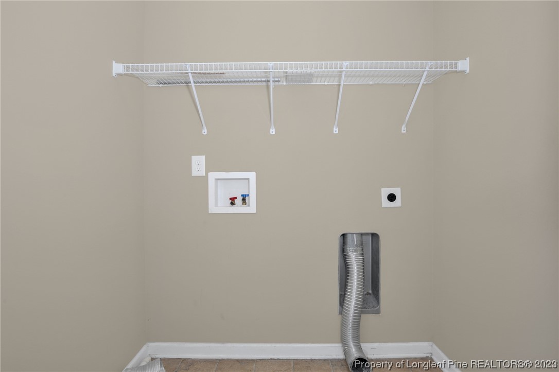 84 Loyalist Road Cameron, NC 28326 - Photo 22 of 40 a view of small space with racks on the wall