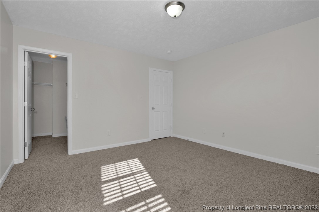 84 Loyalist Road Cameron, NC 28326 - Photo 24 of 40 wooden floor in a empty room