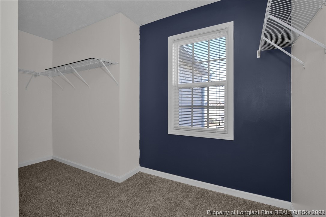 84 Loyalist Road Cameron, NC 28326 - Photo 27 of 40 a view of an empty room with a window