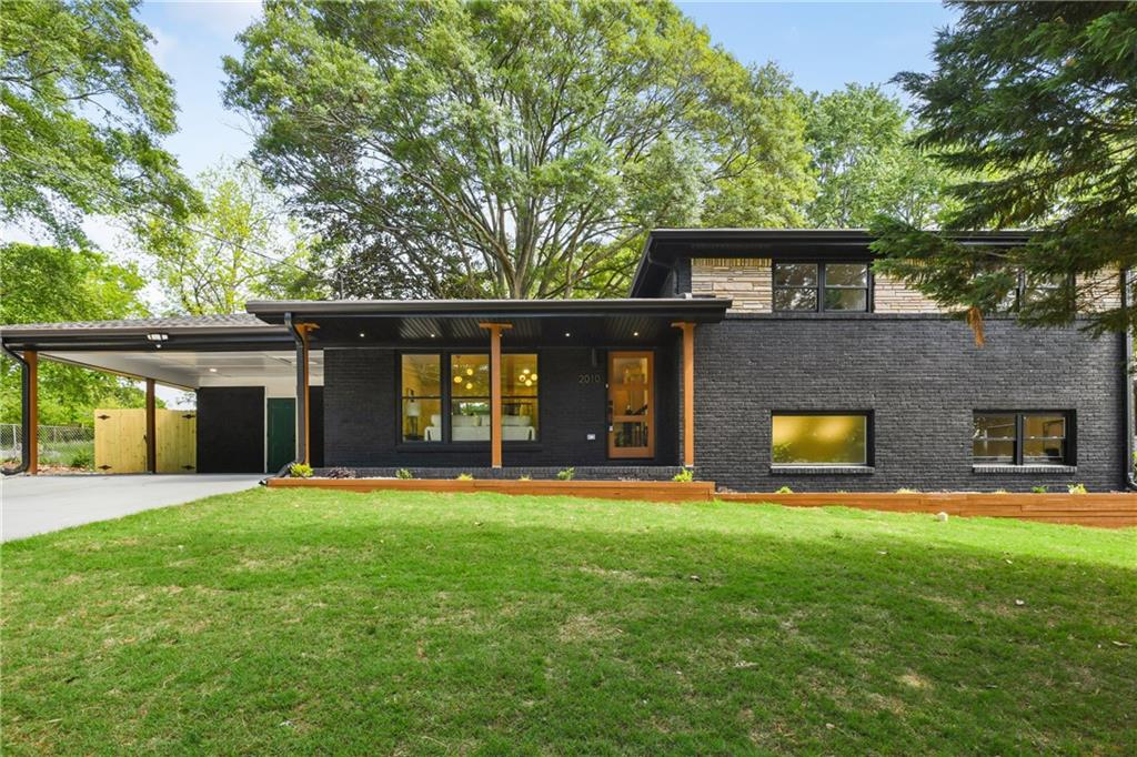 front view of a house with a yard