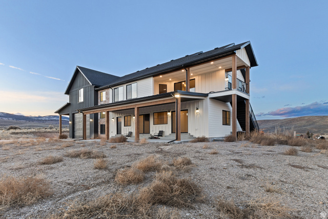 2920 West Temple Cyn Road Laketown, UT 84038 - Photo 2 of 69 South East SideHardie siding and stone accent exterior.Asphalt shingle and metal roof