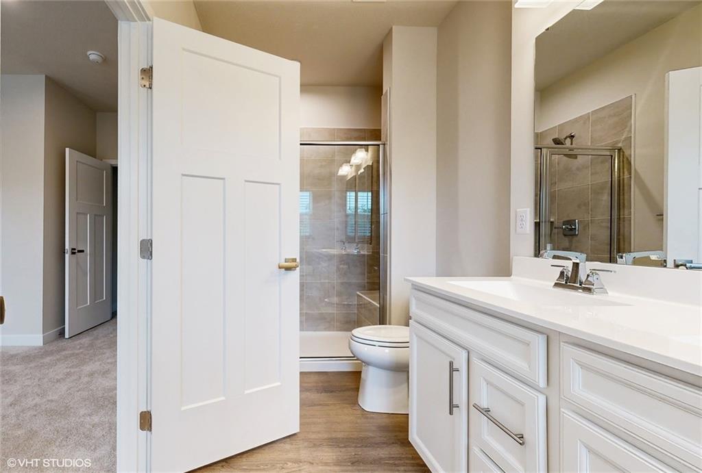 4908 Spruce Road Gibsonia, PA 15044 - Photo 21 of 39 a bathroom with a granite countertop sink toilet and shower