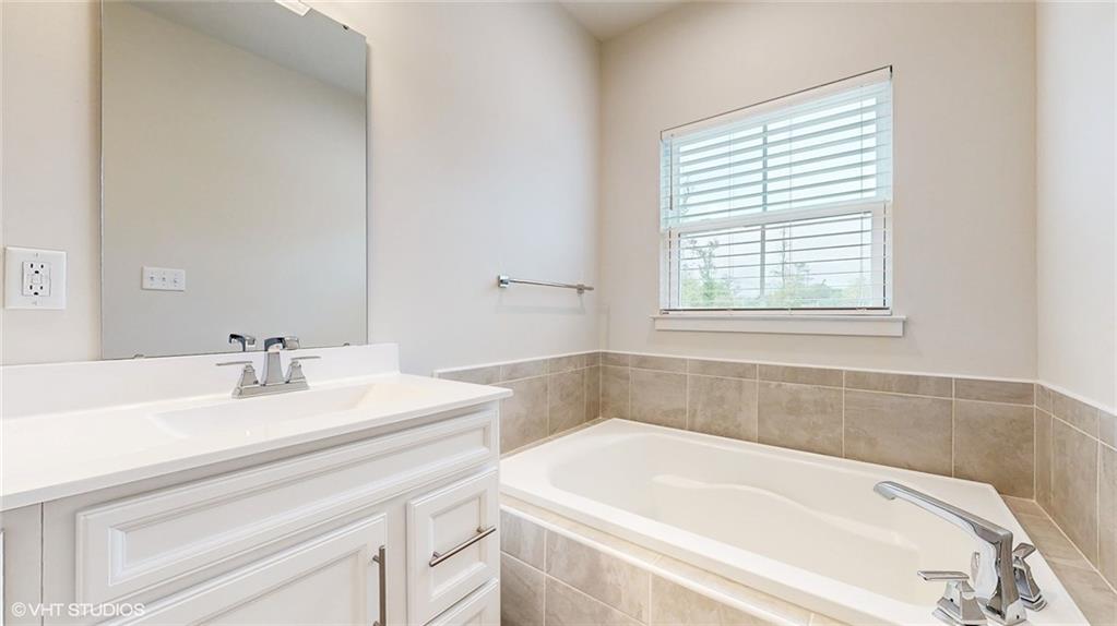 4908 Spruce Road Gibsonia, PA 15044 - Photo 23 of 39 a white bath tub sitting next to a white sink