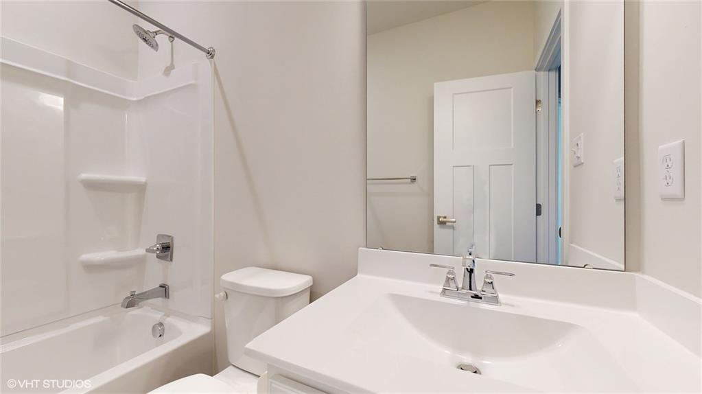 4908 Spruce Road Gibsonia, PA 15044 - Photo 29 of 39 a bathroom with a sink a toilet and shower