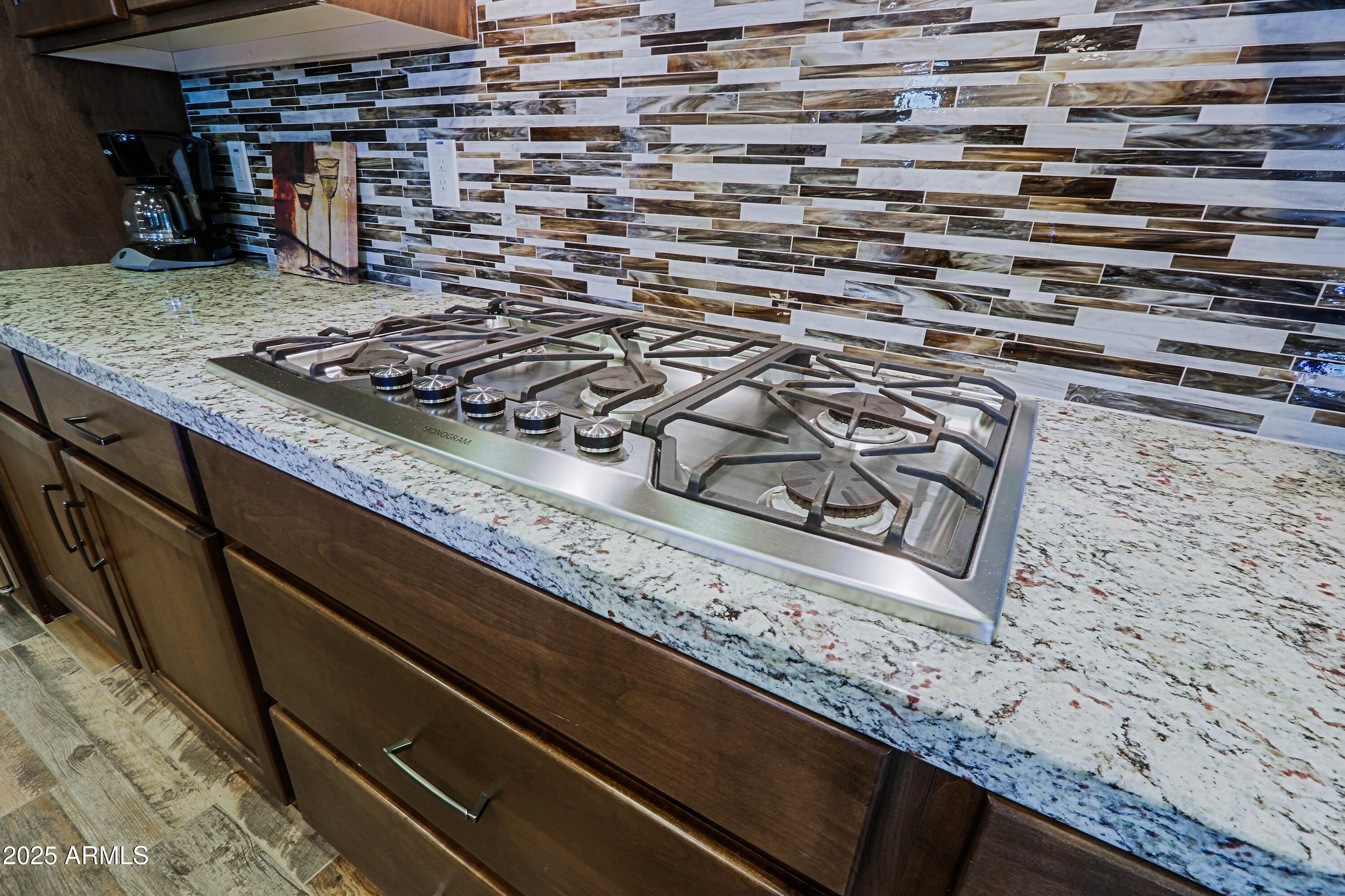 18004 East Silver Sage Lane Rio Verde, AZ 85263 - Photo 17 of 92 a close view of stove top oven