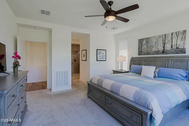 a view of a porch with chairs and backyard