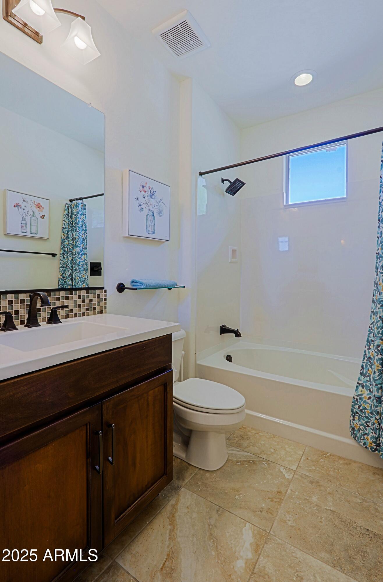 18004 East Silver Sage Lane Rio Verde, AZ 85263 - Photo 40 of 92 a bathroom with a sink a toilet and a bathtub