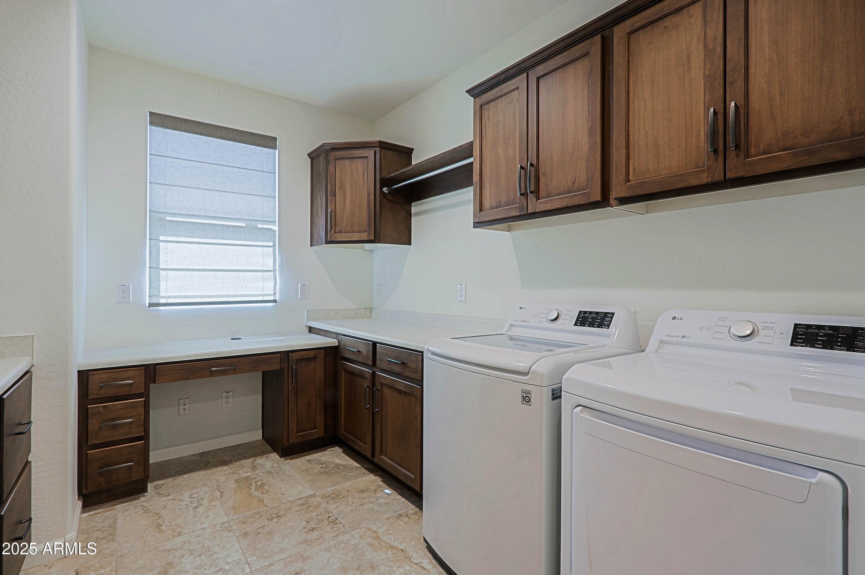 18004 East Silver Sage Lane Rio Verde, AZ 85263 - Photo 43 of 92 a utility room with sink dryer and washer