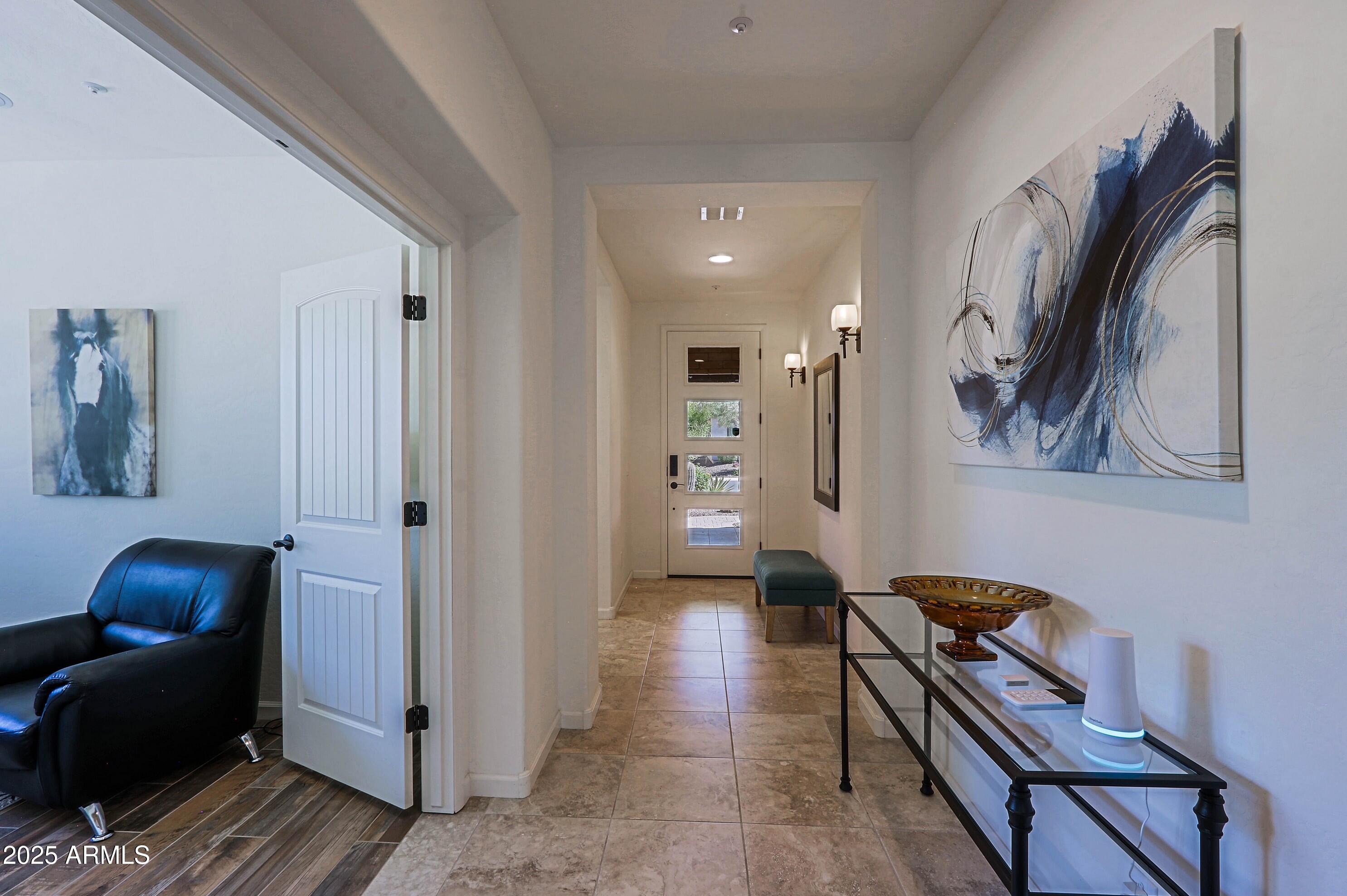 18004 East Silver Sage Lane Rio Verde, AZ 85263 - Photo 6 of 92 a living room with furniture and a painting