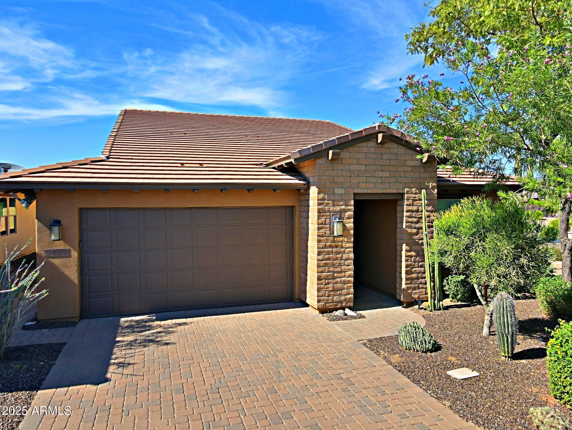 18004 East Silver Sage Lane Rio Verde, AZ 85263 - Photo 88 of 92 a front view of a house with a yard