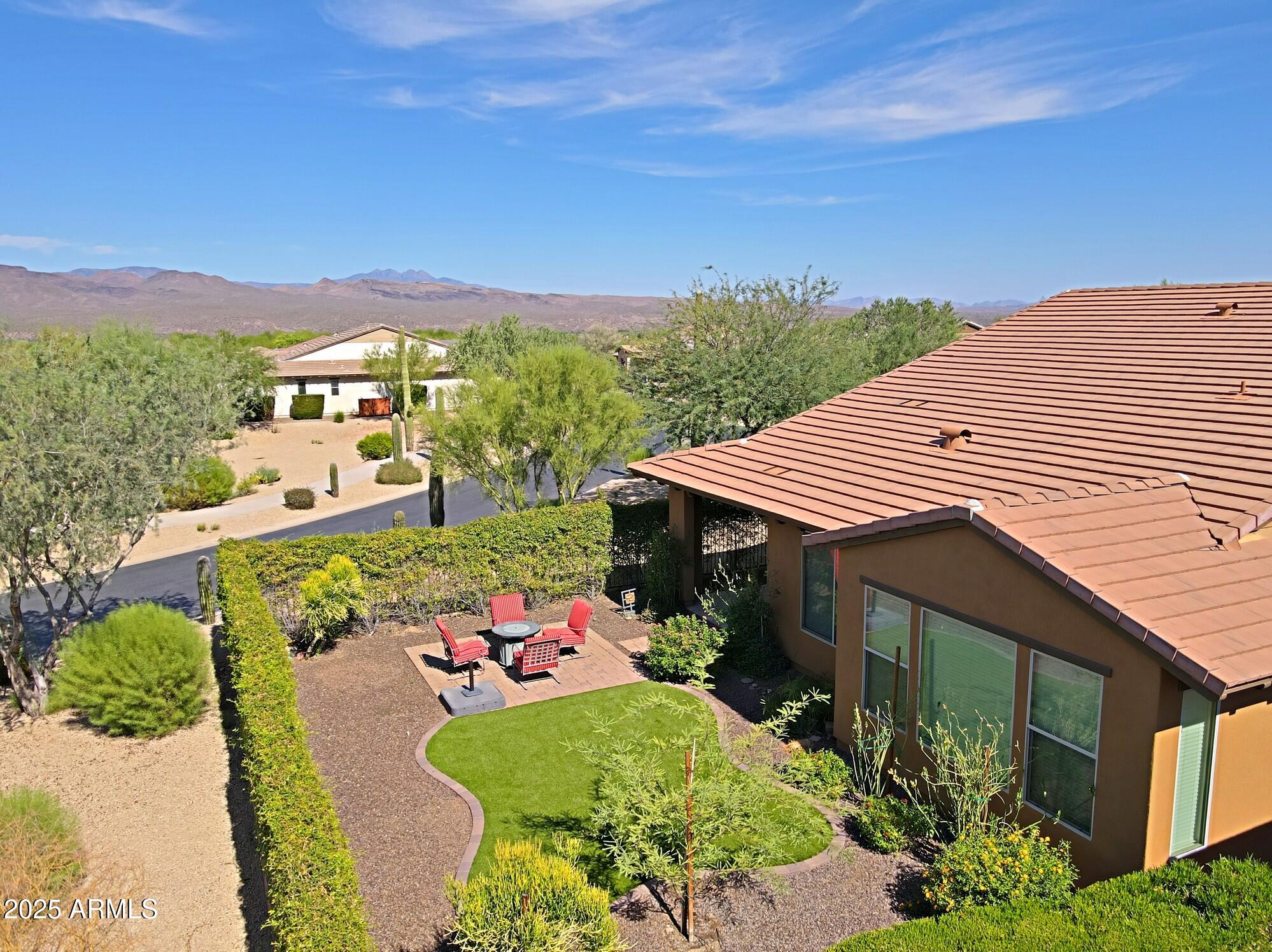 18004 East Silver Sage Lane Rio Verde, AZ 85263 - Photo 90 of 92 a front view of a house with a yard