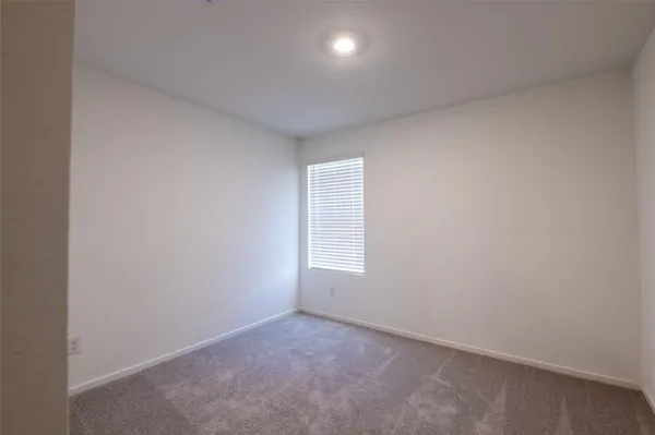 an empty room with window