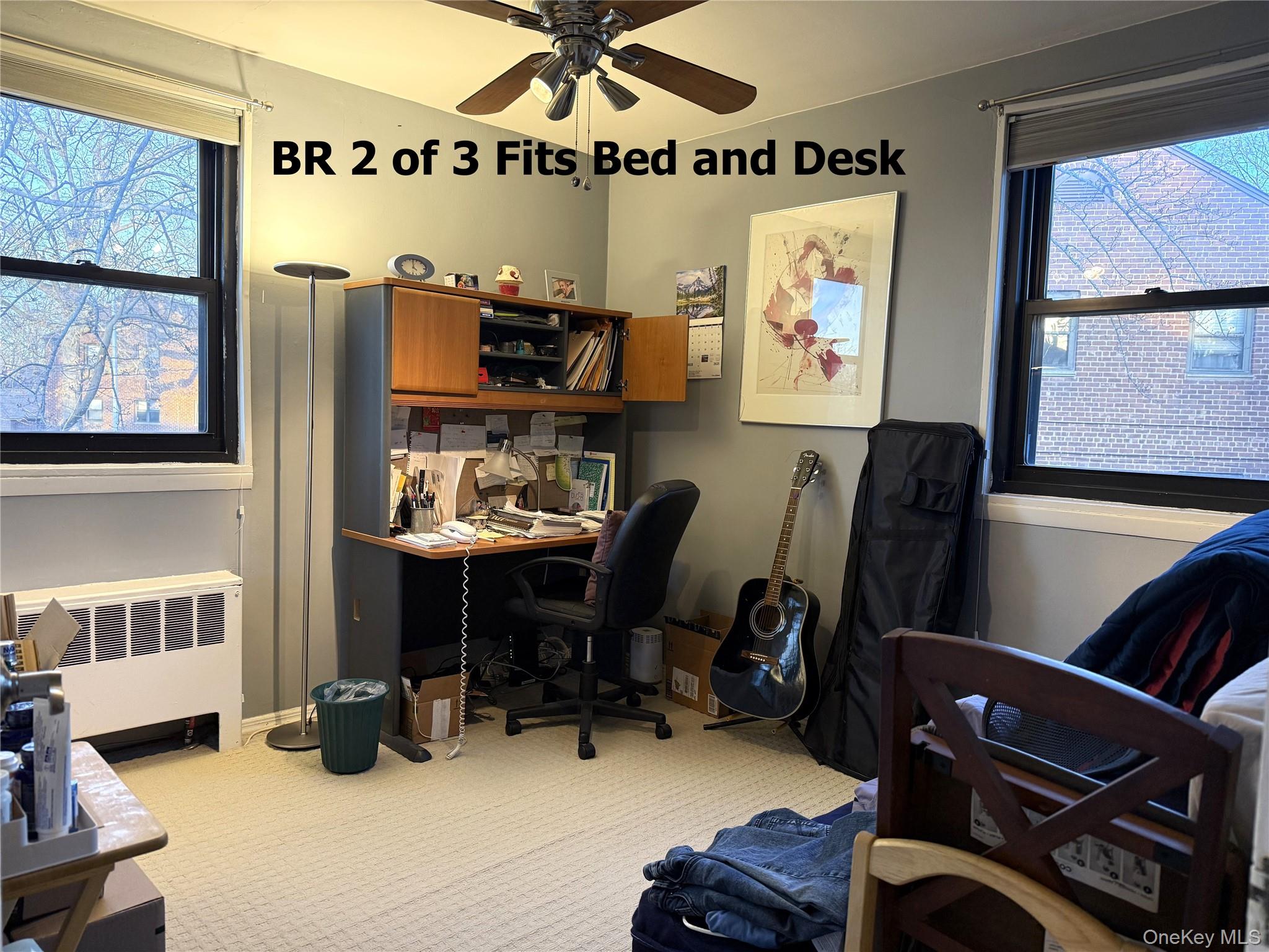 245-48 62nd Avenue, Unit UPPER 2/3BR Queens, NY 11362 - Photo 11 of 29 a view of a workspace with furniture and a window
