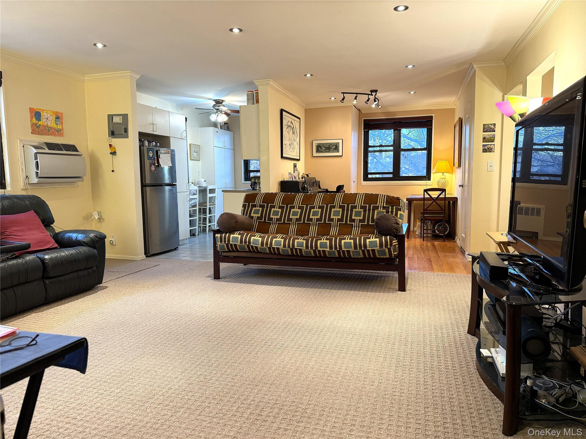 245-48 62nd Avenue, Unit UPPER 2/3BR Queens, NY 11362 - Photo 14 of 29 a bed room with furniture and a flat screen tv