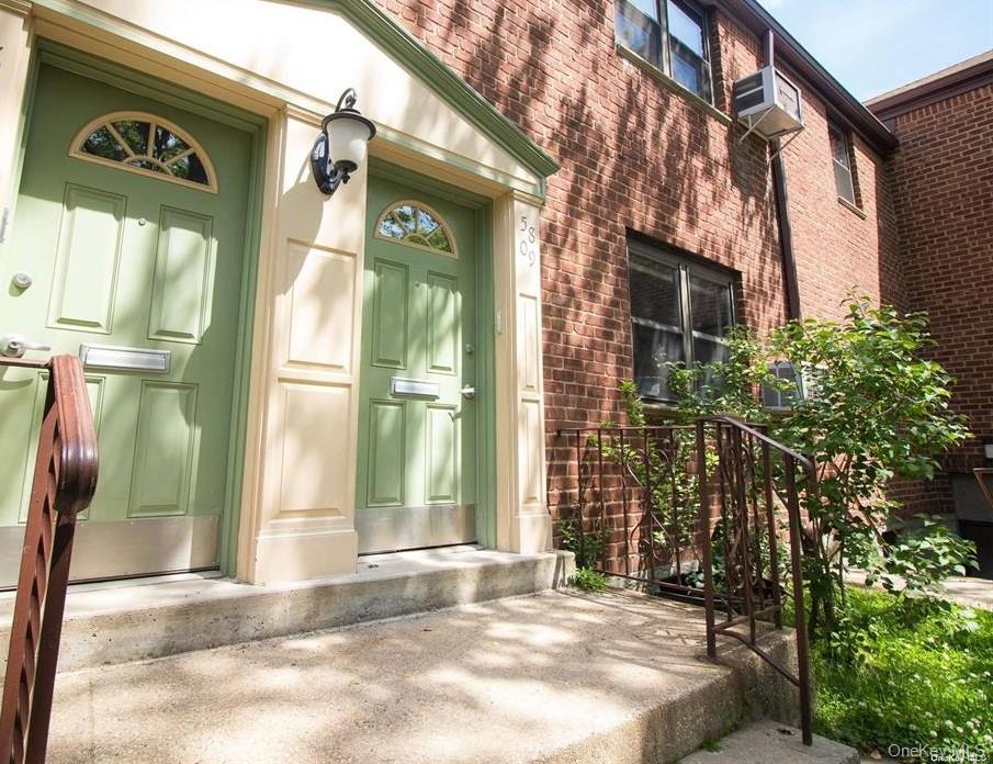 245-48 62nd Avenue, Unit UPPER 2/3BR Queens, NY 11362 - Photo 25 of 29 a view of a brick house with a large windows