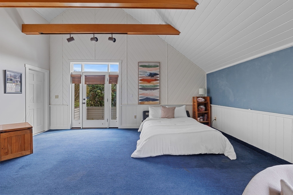 52 Pineswamp Road Ipswich, MA 01938 - Photo 17 of 41 a bedroom with a bed and a night stand