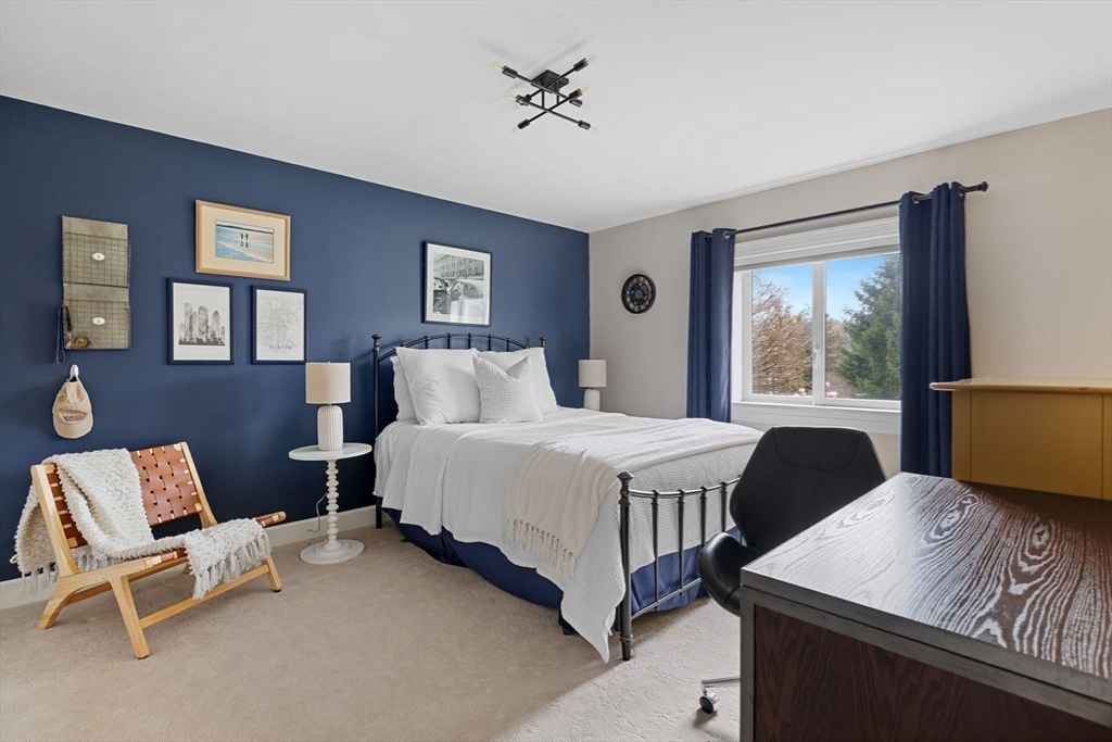 52 Pineswamp Road Ipswich, MA 01938 - Photo 19 of 41 a bedroom with a bed chair and window